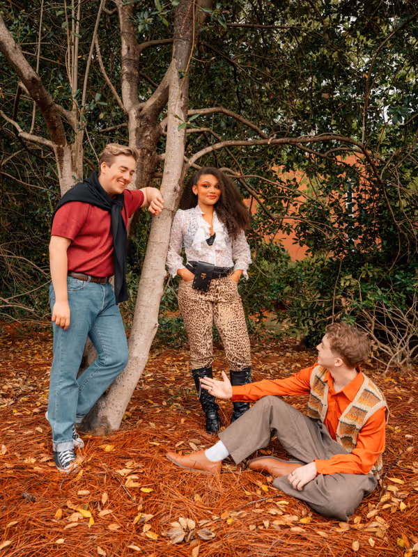 (L to R): Elliot Choate (Henry), Emmalynn Bruce (Antigone Tig), and Jonah Uffelman (Nikolas/The Guard) for Antigone 1989: A Town Hall Musical. Photo by Geovanny Soto. 4
