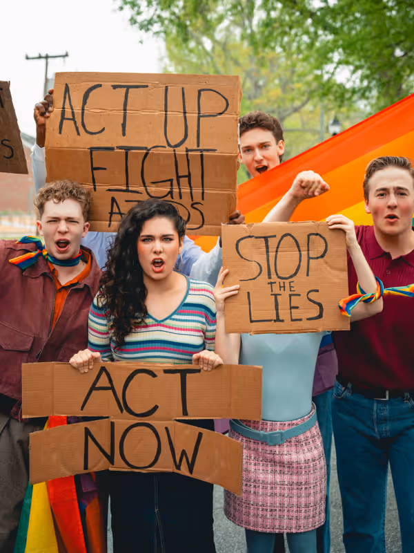 (L to R): Jonah Uffelman (Nikolas/The Guard), Victoria Martinez (Ensemble/Swing), Elliot Sullivan (Ensemble/Swing), Elliot Choate (Henry) for Antigone 1989: A Town Hall Musical. Photo by Geovanny Soto 7