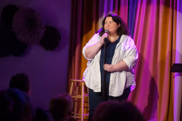 Jenny Napolitano performs material from Body Language at Bergamot Comedy Fest, March 2026. Photo credit: Kiel Phillips. 1