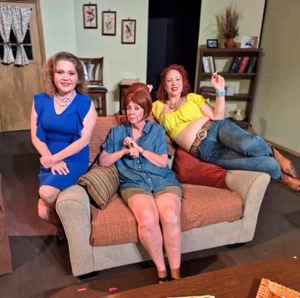 These ladies say,    Come on down y   all and see our sordid show!    5
