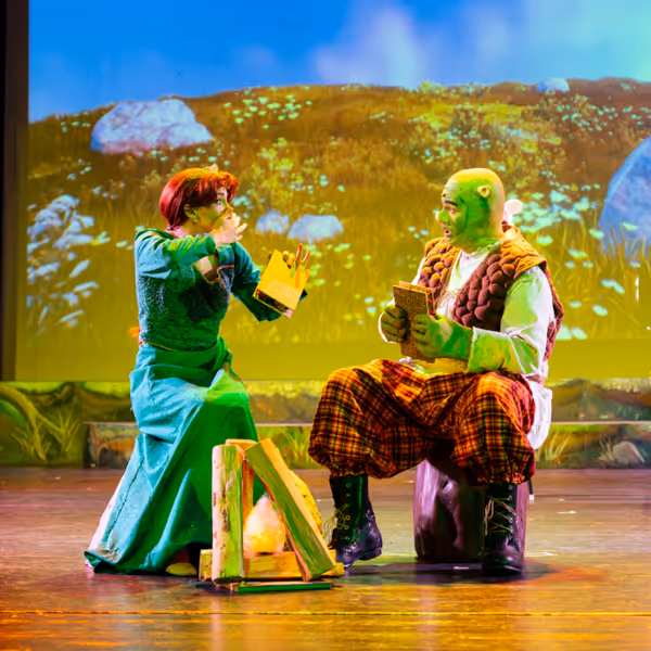 Emma Price as Princess Fiona and Matthew Robison as Shrek 6