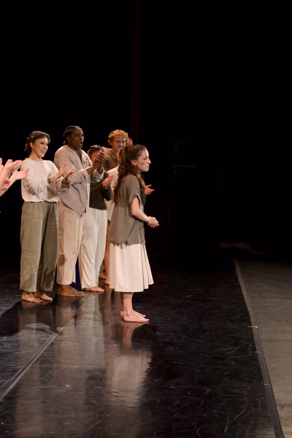 Adrienne Pelletier accepting a standing ovation for her choreography of Maine Dance Company's Unearthed 9