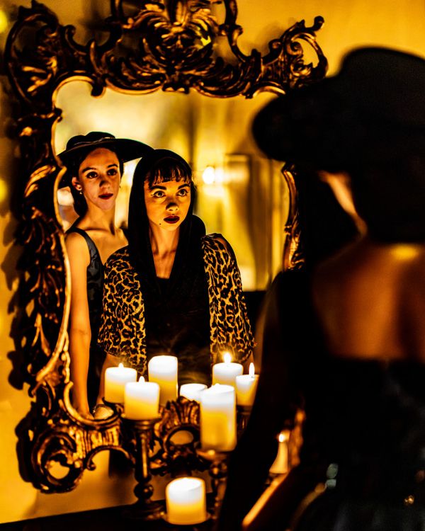 (L-R) Rebekah Brannan as Betty Shaeffer looks over the shoulder of Tiffany Brannan as Norma Desmond, the faded star haunted by a rising talent. 5