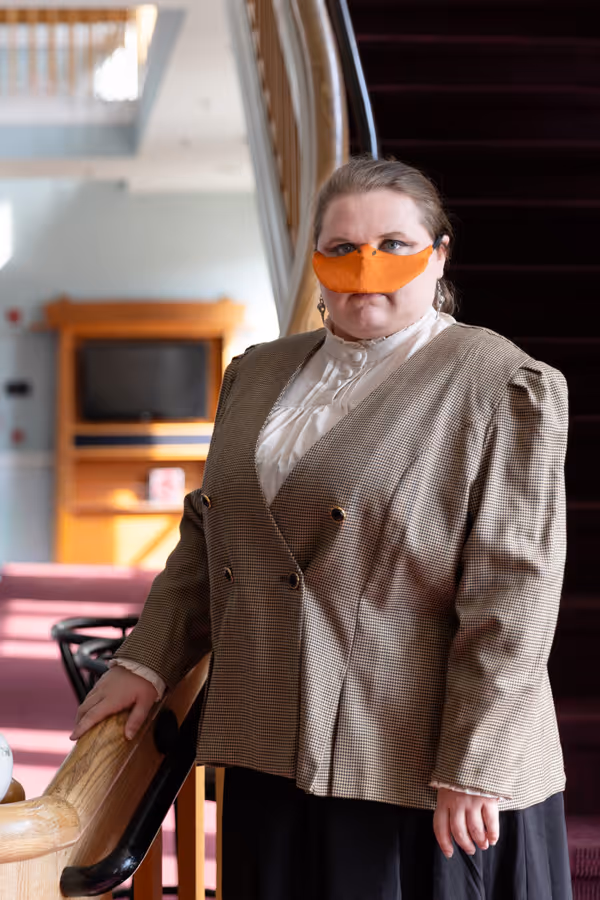 Hollie Pryor plays the Marqu  s de Penaquill, the hopeful delegate from Portugal in Heart of Duckness by A.J. Ditty. Photo by Hannah Daly Ellsworth. 6