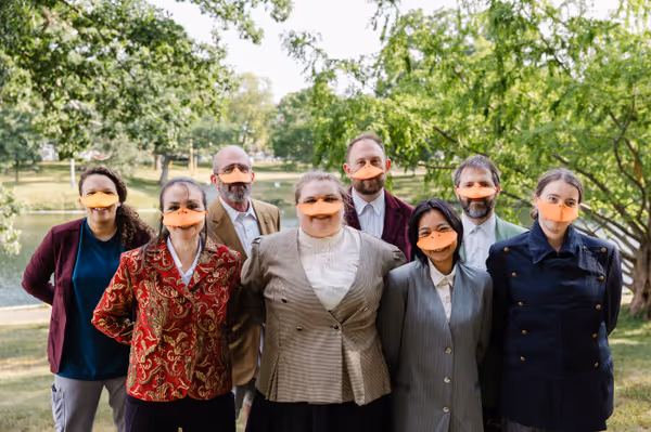 The entire cast of Heart of Duckness by A.J. Ditty near the duck pond in Deering Oaks Park (l-r, Maya Williams, Allison McCall, Gary Penn, Hollie Pryor, Ryland Garnett, Chris Say, Nate Speckman, and M 5