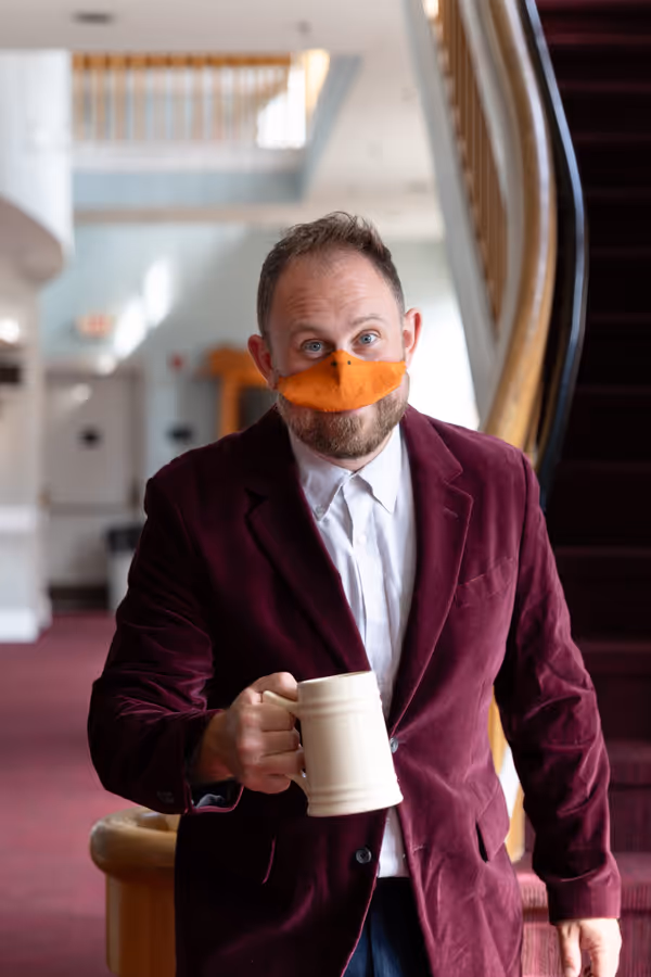 Ryland Garnett plays Baron de Crested, the French Delegate looking to party in Heart of Duckness by A.J. Ditty. Photo by Hannah Daly Ellsworth. 10