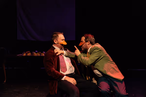 Mr. Duck (Nate Speckman, right) has a more aggressive negotiation style with Baron de Crested (Ryland Garnett, left) in Heart of Duckness by A.J. Ditty. Photo by Kat Moraros Photography. 8