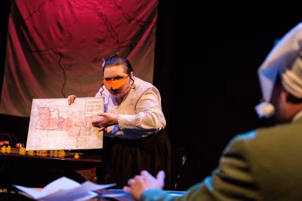 The Marquês de Penaquill (Hollie Pryor) goes over her new plans for colonizing Africa with Mr. Duck (Nate Speckman) in Heart of Duckness by A.J. Ditty. Photo by Kat Moraros Photography. 11