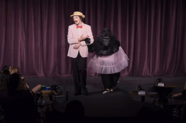 Austyn Myers as Emcee and Sarah Schechter as Gorilla. Photos by Ken Jacques. 12