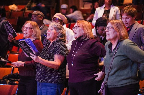 Audience members sing- along at Black Nativity. Photo by Joe Moore. 7