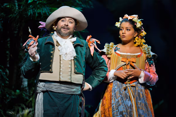 A scene from LA Opera's 2023 production of The Marriage of Figaro.  Shown: Craig Colclough as Figaro and Deepa Johnny as Barbarina. (Photo: Cory Weaver) 1