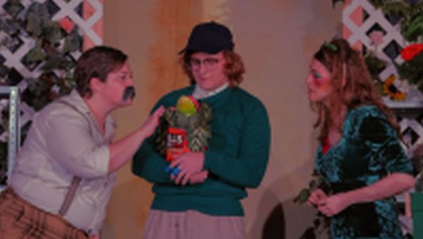 Mr Mushnik, Seymour, Audrey and Audrey II at Lakeland Players Little Shop of Horrors 2