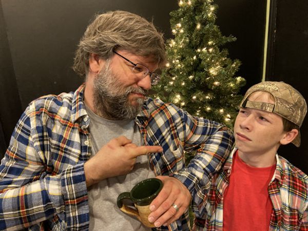 North Raleigh Arts & Creative Theatre (NRACT) is proud to present the holiday comedy Fruitcakes, by Julian Wiles. This family-friendly play is just the recipe for a fun-filled and touching evening of holiday cheer. Jamie, a kid who has run away from home, at first thinks the town’s inhabitants are nuttier than fruitcakes but soon he comes to admire, appreciate, and adore this quirky little town. A moving story of alienation, understanding and reconciliation, Fruitcakes provides audiences with a heaping helping of holiday warmth and Christmas cheer.
The show features Craig Johnson as MACK, a grandfather who befriends JAMIE, played by Andrew Farmer. Two bickering elderly spinsters are played by Sherri Matson (MISS SARAH) and Sharon Galluzzo (MISS ALICE); Ryan Madanick portrays BEEBO DANTZLER, the town’s only police officer; and Tim Wiest brings to life SKEETER, a fisherman who catches fish by reciting Shakespeare. Also in the cast are Kalynn Chambers (BETTY JANE), Melanie Carviou (MATTIE SUE), Danny Dove (RICK MORGAN), and the children of McCord’s Ferry, Georgia: Caroline Britt, Ben Jones, Caroline Jones, Alexandra Petersen, Drew Sarratt, Maya West, Naima West, Parker West, and Nicholas Yorgensen.

Director: Judy M. Dove
Stage Manager: Victoria Barnes
Producer: Craig Johnson 
NRACT Managing Artistic Director: Timothy Locklear
 
Performance Dates: Weekends, December 6 to December 22, 2019; Fridays and Saturdays at 8pm and Sundays at 3pm.
North Raleigh Arts and Creative Theatre, 7713-51 Lead Mine Road, Raleigh, NC  27615
Tickets available now at http://www.nract.org/shows#/fruitcakes/  or call 919-866-0228.
 
This show is produced by special arrangement with Dramatic Publishing.
Photo: Judy M. Dove
 1