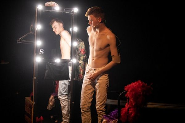 Young, trendy Spencer leaves home and hits Soho like a whirlwind in a journey of love, laughter, heartbreak and happiness. Working in a clothes store, partying at the weekend and busking on the streets. But all that glitter fades when Spencer finds love and stumbles into the darker side of the neon lights and tight white t-shirts. This modern tale on the gay scene which can be harsh and lonely surrounded by glamour, sex and songs. 5