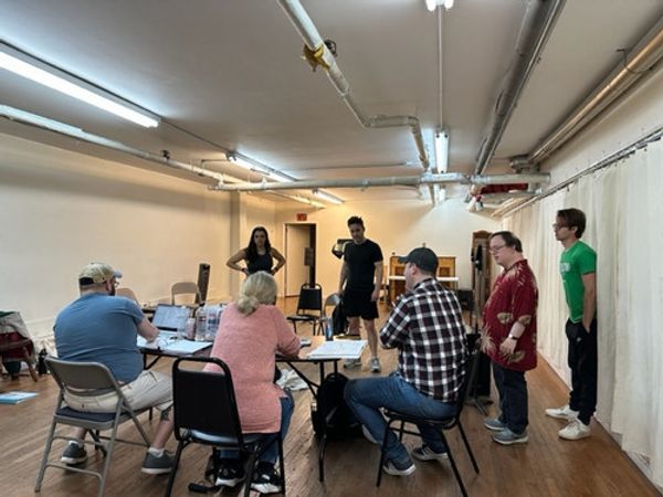 Rehearsal photo of the cast and creative team of Billy the Bomber 1