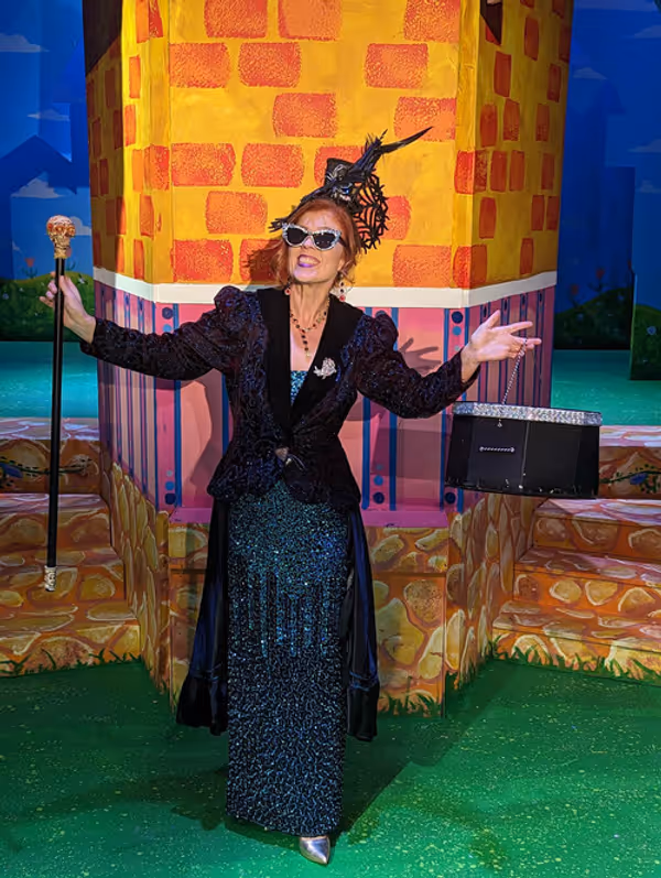 Eric (Stephen Denning) and Mary (Maria Hefte) share a light hearted moment with their daughter Rapunzel (Kelly Laines) 8