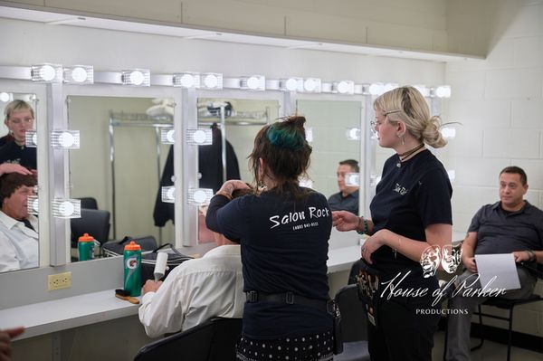 Joe Paul Garcia and Rick Howard in hair and makeup, highlighting the level of care, precision, and professional artistry dedicated to shaping each character before they take the stage. 10