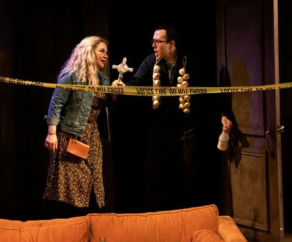 Grace (Leah Berst) in possessed living room. 4