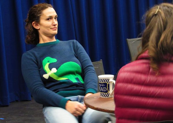 Director Elina de Santos giving a presentation at the Design Preview Party for 