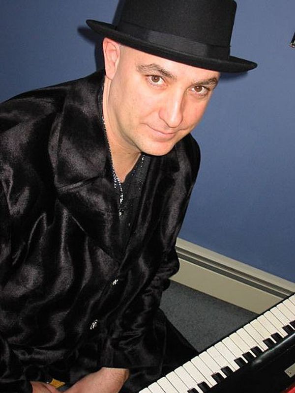 Ed Alstom, New York Yankees organist, is featured in First Flight's upcoming benefit Come Fly with Us! 1