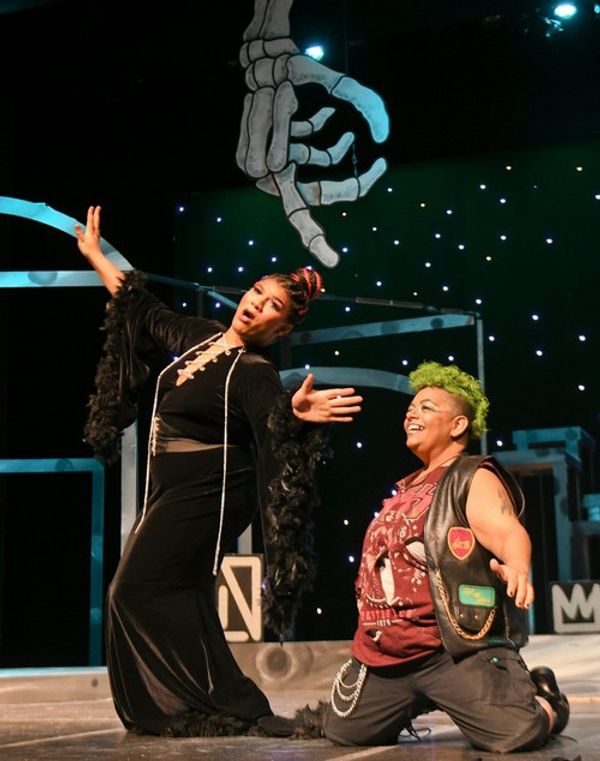 Oberon (Javauna Harris) tells her mischievous sidekick Puck (Angela Flores) of her plans to get revenge on her queen, Titania (Maggie Moreno) for not giving her the changeling boy she asked for.
Photo Credit:  Al Caballero 2