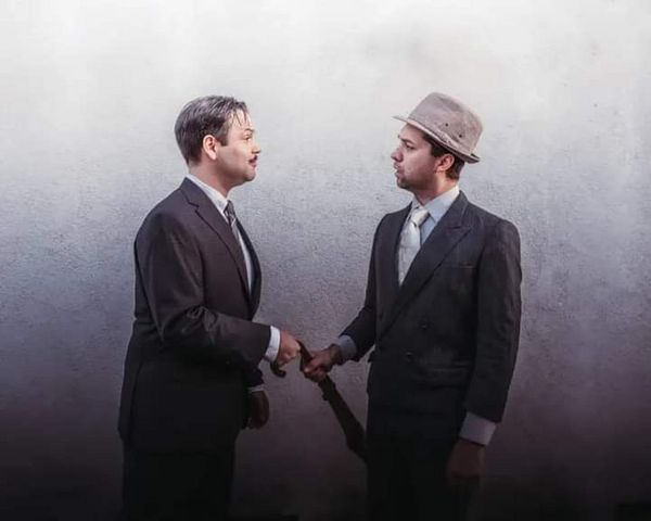 A Member of The Press Poet Society: Rizzy Fuentes as Walter Burns and Darryl Maximilian Robinson as Roy V. Bensinger in The CCPT revival of The Front Page. 16