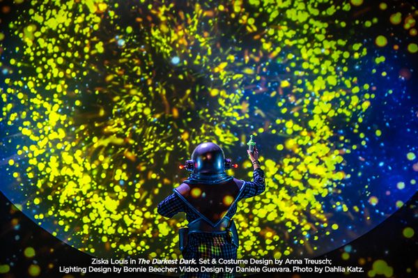 Ziska Louis in The Darkest Dark. Set & Costume Design by Anna Treusch; Lighting Design by Bonnie Beecher; Video Design by Daniele Guevara. Photo by Dahlia Katz. 1