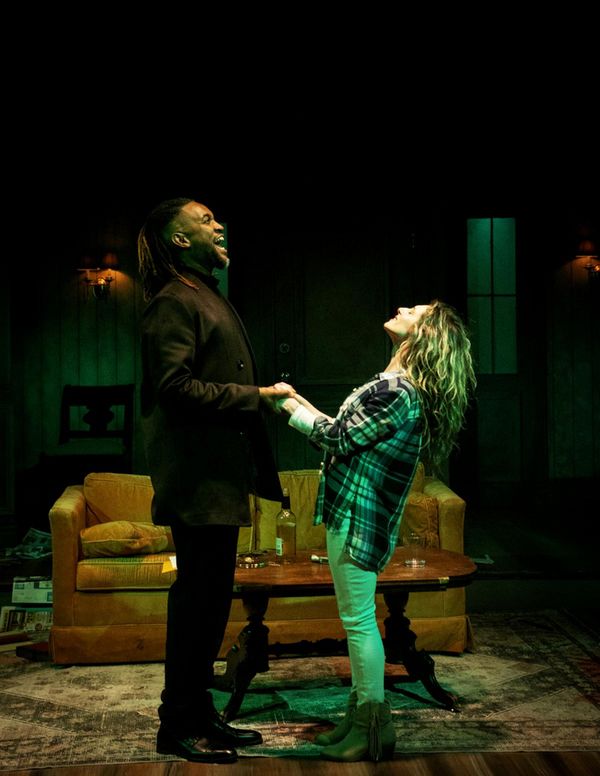 Grace (Leah Berst) in possessed living room. 7