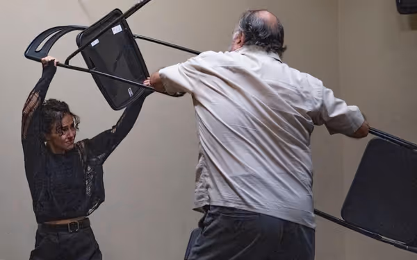 Una confronts the past as Ray watches from a distance in a tense moment from Blackbird. 5