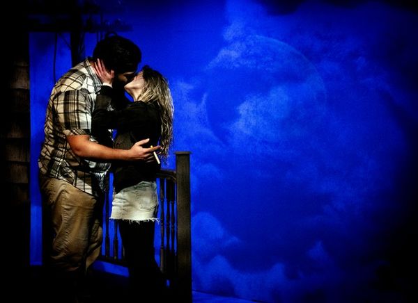 Grace (Leah Berst) in possessed living room. 5