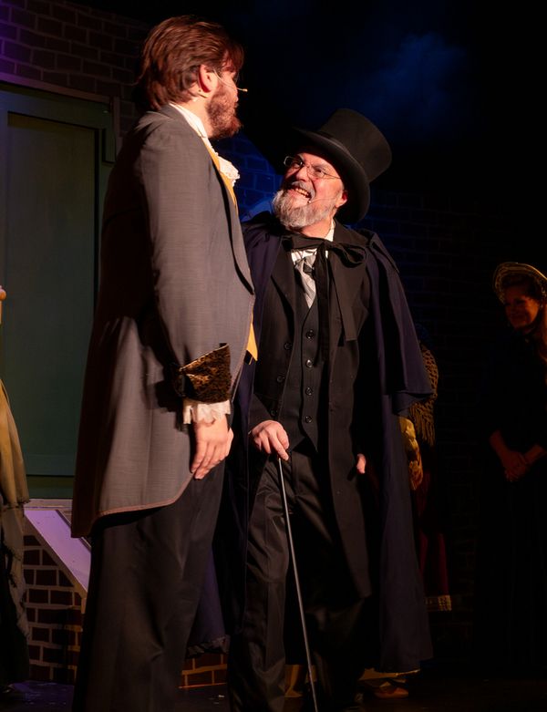 L TO R: Matt Summers as Fred, Darrell Meek as Scrooge   3