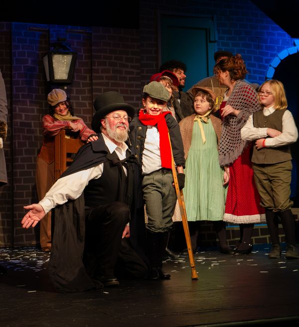 L to R: Darrell Meek as Scrooge, Abby C. as Tiny Tim   2