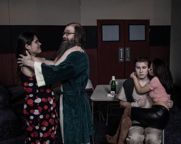 Nicole Shaw as Sandra and Chris Boerner as Scanlon dance as Juliana Penney as Candy Starr cuddles on the nervous lap of Billy Bibbit portrayed by Cole Kaelin. 3