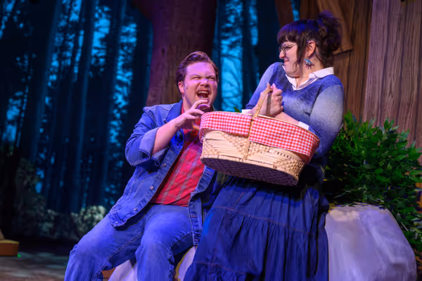 Christopher (Ethan Hines, left) runs into Rachel (Karson Crass, right) and pretends to be the big bad wolf. 1