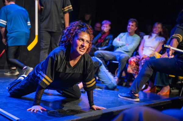 Nohely Quiroz demonstrates a hockey stretch.  4