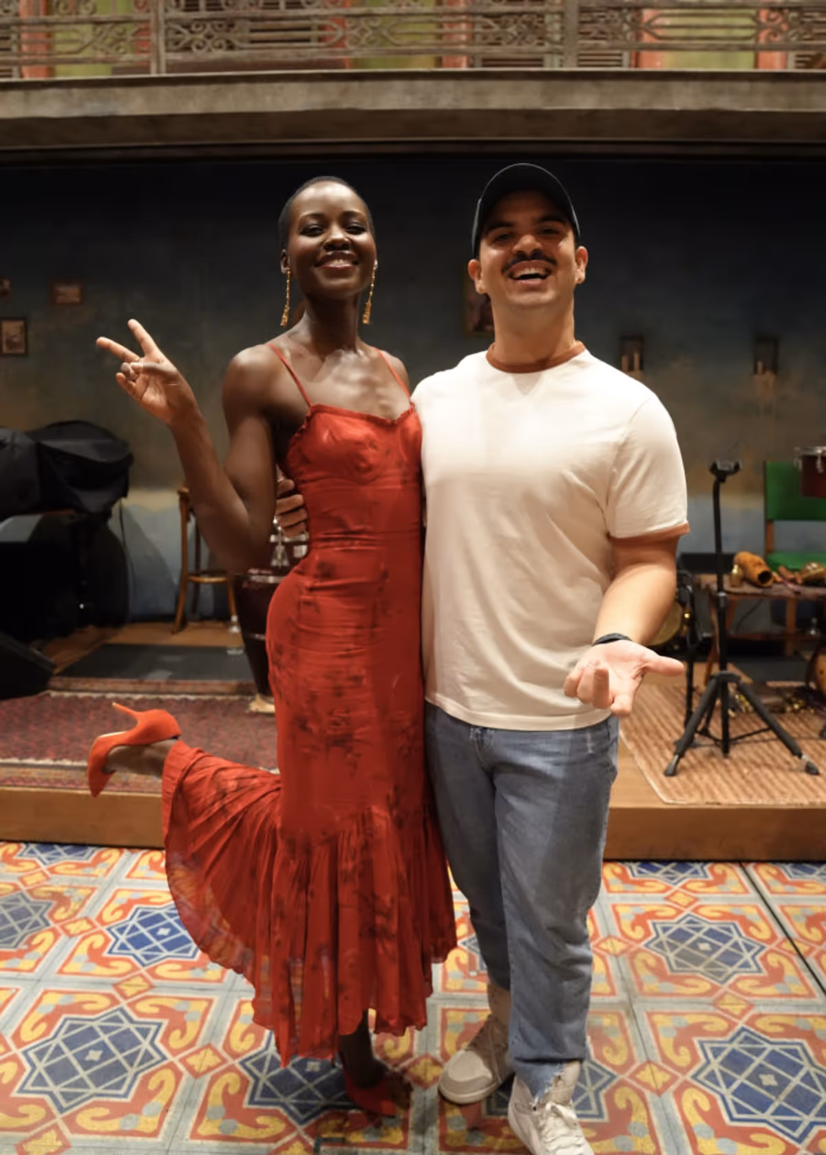 Jesus Pupo with actress Lupita Nyongo following a performance of Broadways Buena… Photo