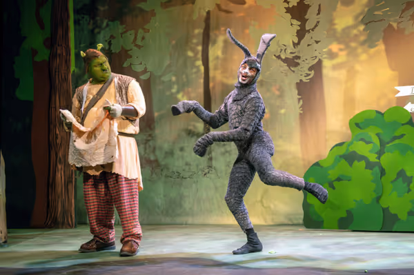 Micah Harvey as Shrek, Brandon Briggs as Donkey 3
