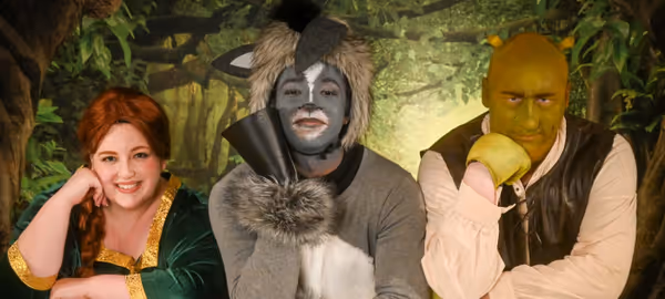 (L to R): Alexandra Overland as Fiona, Ki-Jana Moore as Donkey, and Ben Walker as Shrek. 9