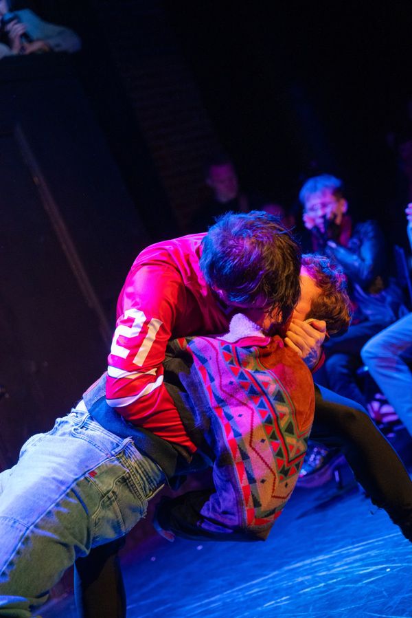 Scott Hunter (Andrew Young) & Kip (Sean Meagher) kiss on the ice. 10