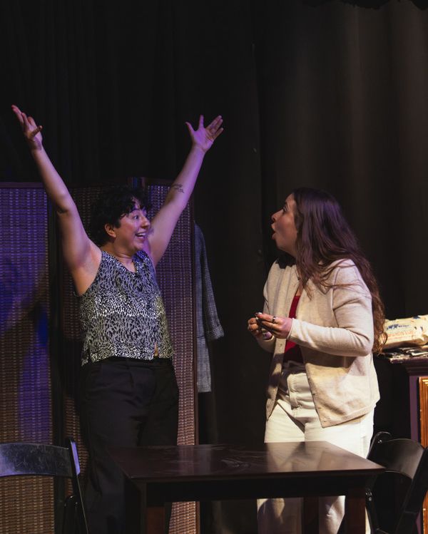 Melanie Santos Cordero as Callie celebrates as Bridgette Dove as Sarah looks on in Stop Kiss. Photo by MCP Photo. 7
