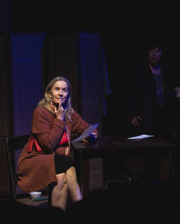 Veronika Surla as Mrs. Winsley waits at a coffee shop for Callie in Stop Kiss. Photo by MCP Photo.   8