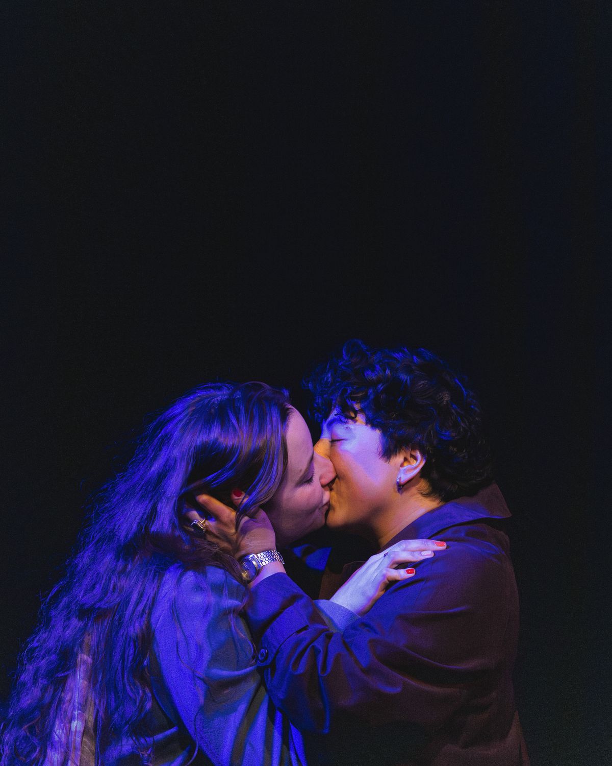 Melanie Santos Cordero as Callie and Bridgette Dove as Sarah share a kiss in the final moment of Stop Kiss. Photo by MCP Photo. Melanie Santos Cordero as Callie and Bridgette Dove as Sarah share a kiss in the final moment of Stop Kiss. Photo by MCP Photo.