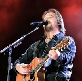 Travis Tritt show poster