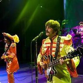 Rain: A Tribute to the Beatles show poster