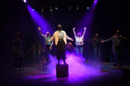 Songs For A New World show poster