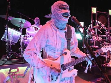 Here Come the Mummies show poster