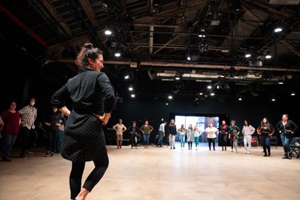 En Communidad show poster