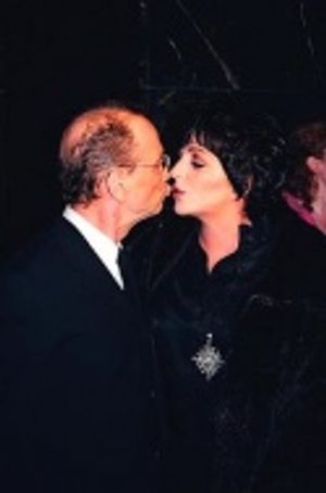 Joel and Liza share a kiss!  Photo