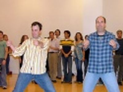 Brooks and Brad kick of the title song Photo