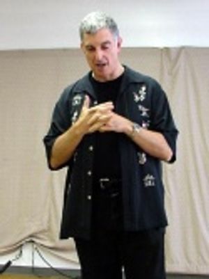 Joel Silberman (Director, Book and Music) welcomes
the press and describes the show. Photo